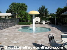For swimmers not yet accustomed to the deep end, Boynton Beach's Greystone community provides a fun wading pool adjacent to the main swimming pool.
